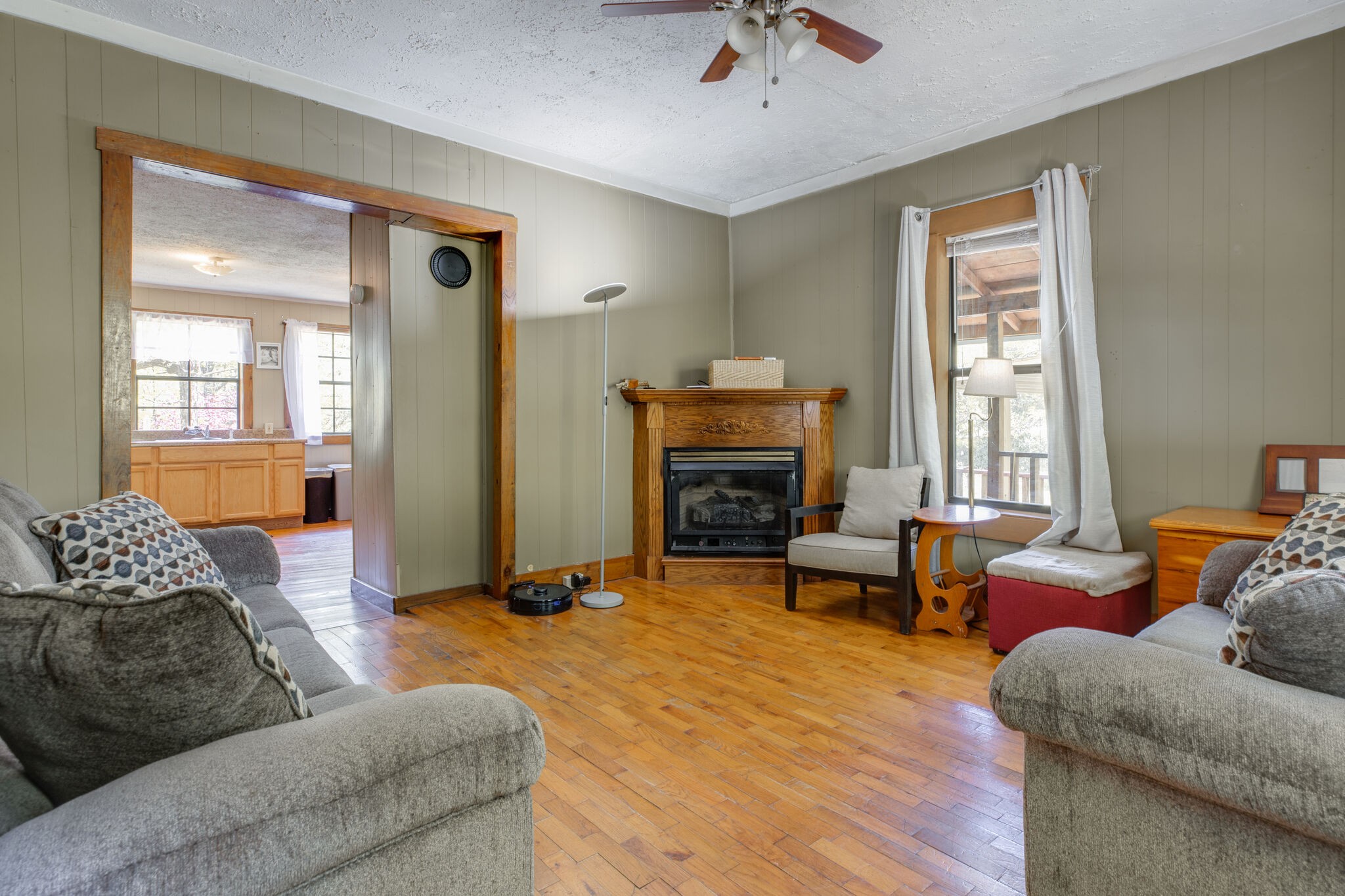 7196 Pinewood Road Nunnelly, TN 37137 - Photo 13 of 49 a living room with furniture and a fireplace