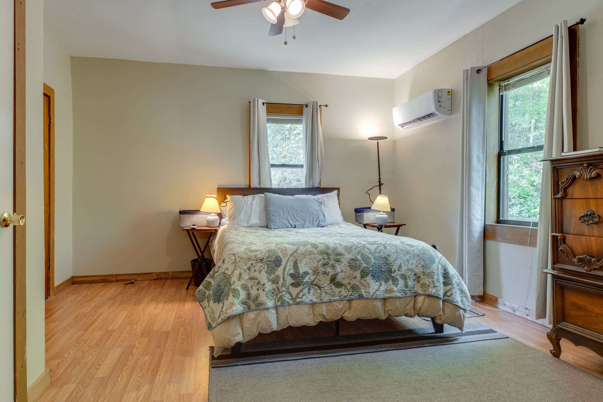 7196 Pinewood Road Nunnelly, TN 37137 - Photo 17 of 49 a bedroom with a bed and a chandelier