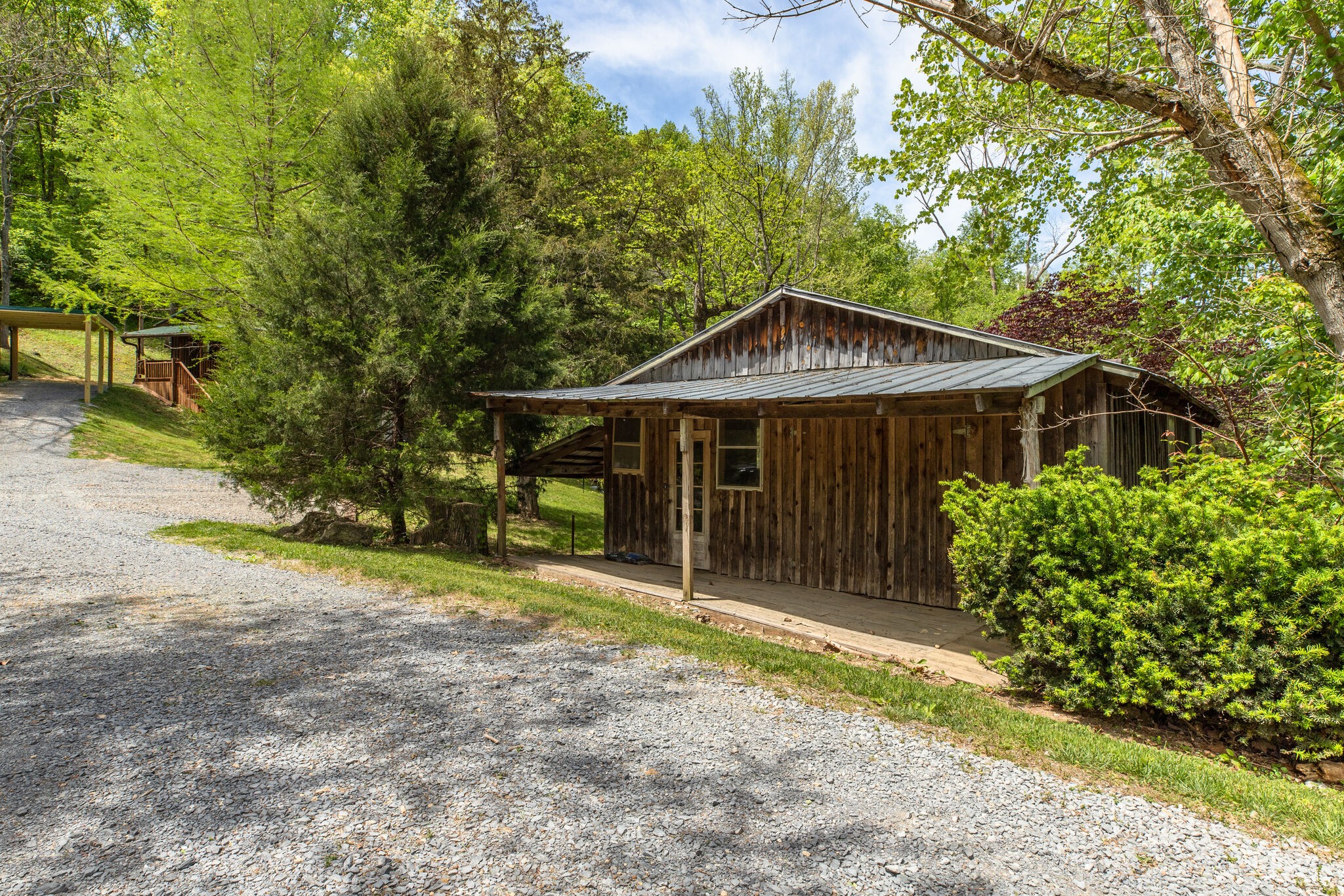 7196 Pinewood Road Nunnelly, TN 37137 - Photo 26 of 49 a front view of a house with garden