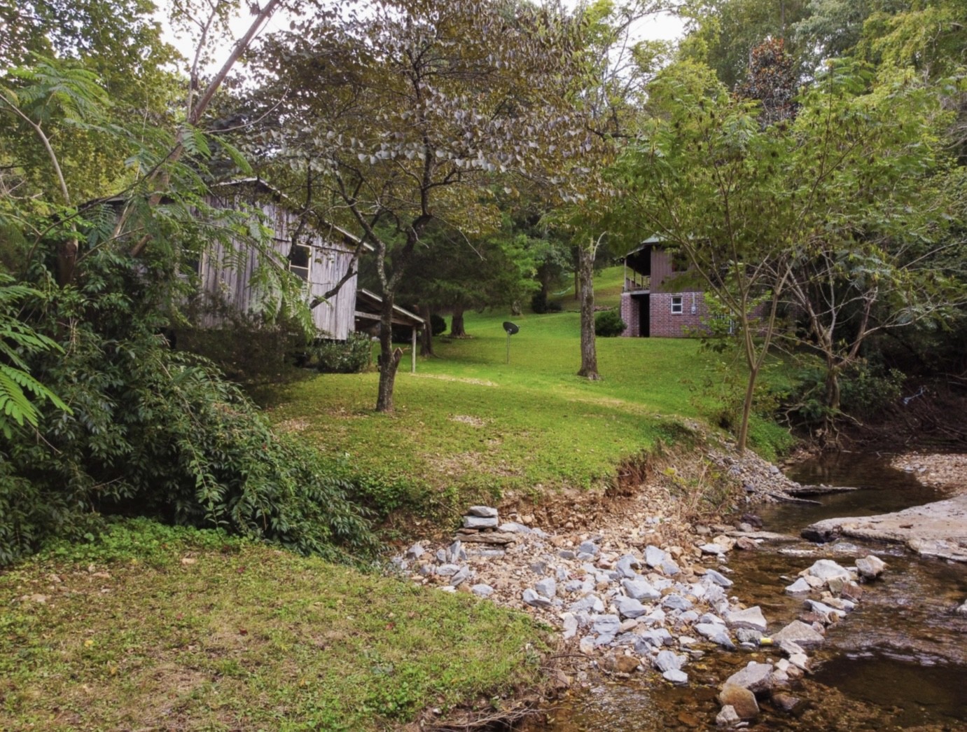 7196 Pinewood Road Nunnelly, TN 37137 - Photo 29 of 49 a view of a park with large trees