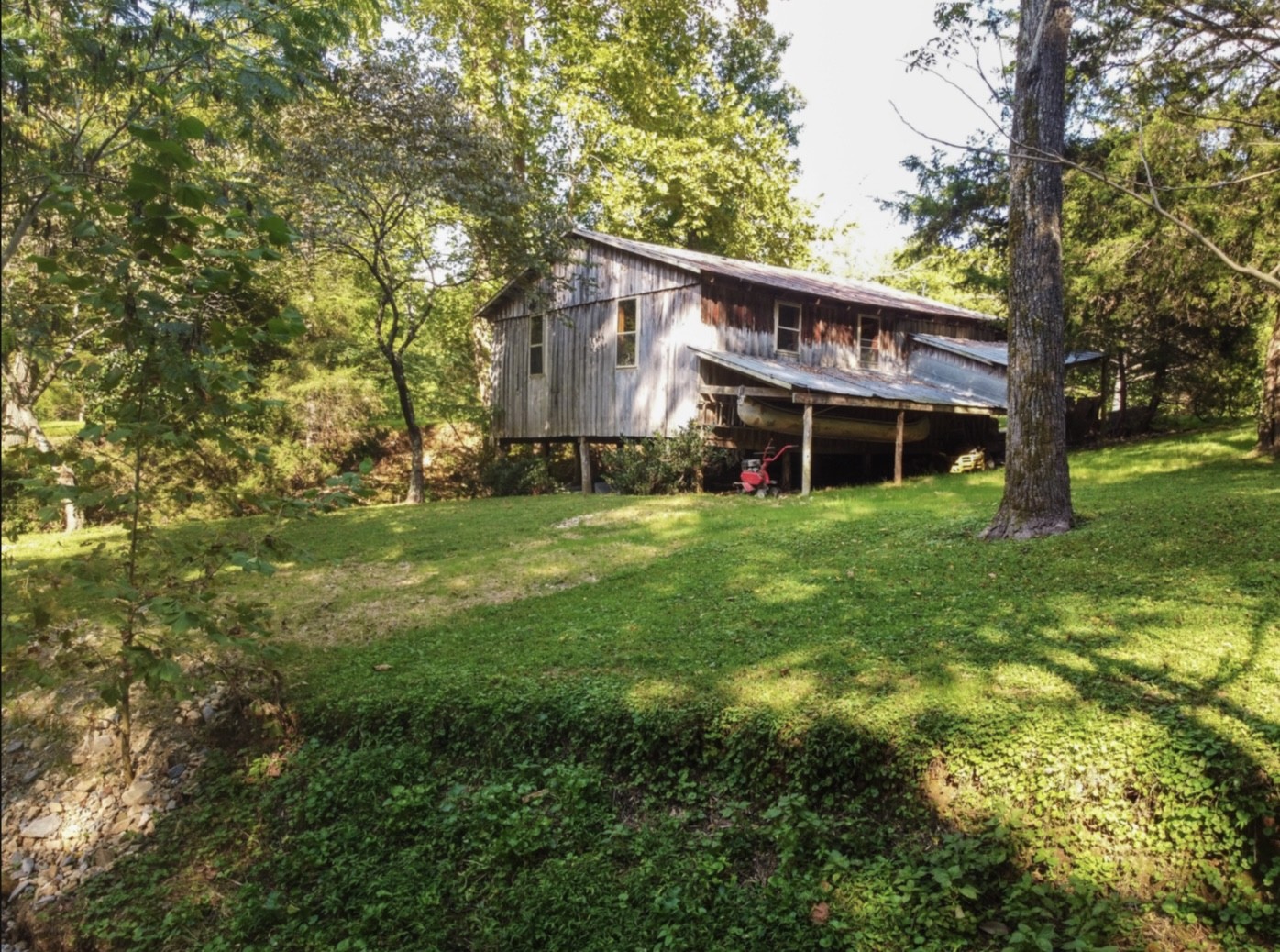 7196 Pinewood Road Nunnelly, TN 37137 - Photo 34 of 49 a view of a house with a yard