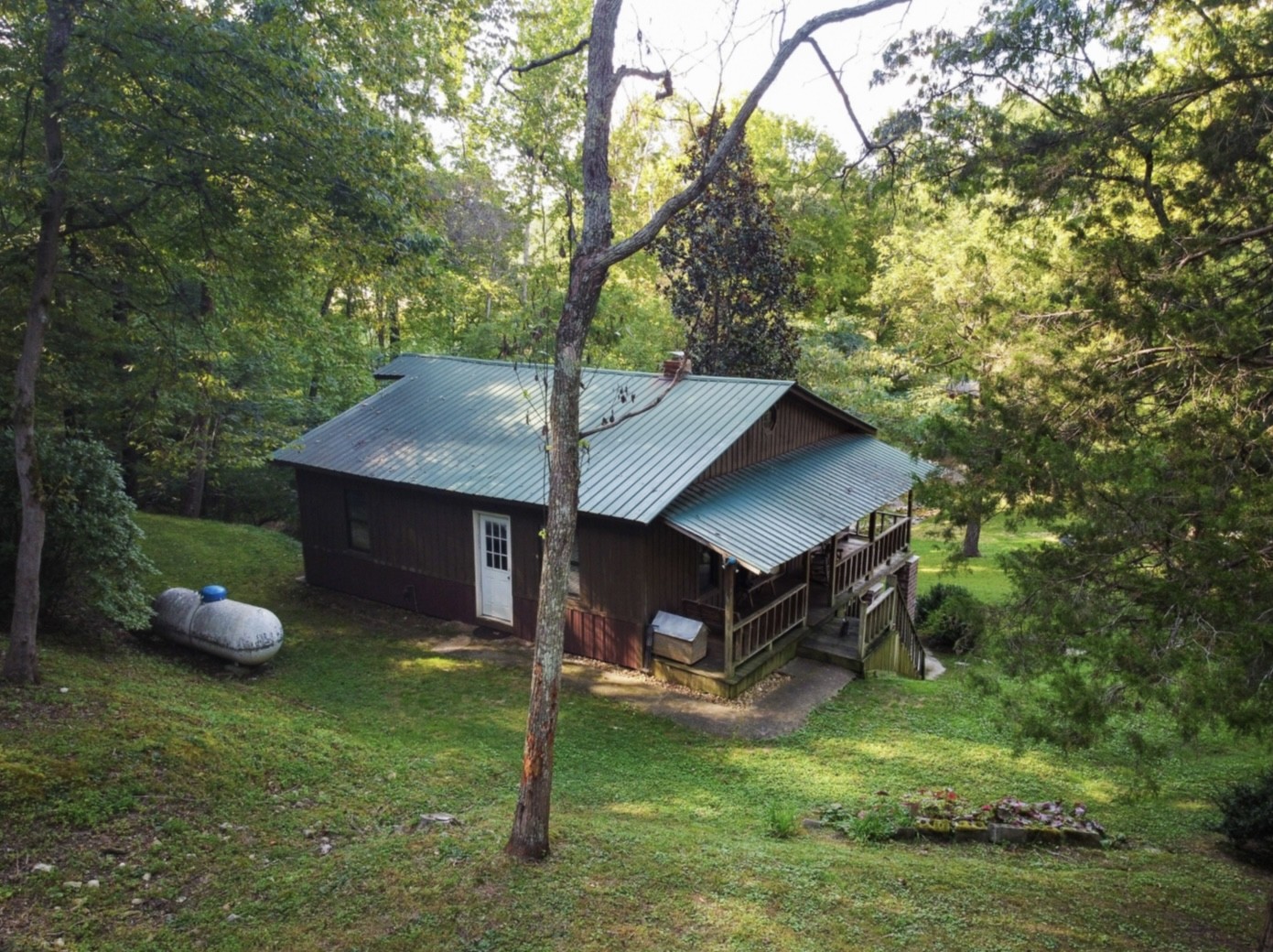 7196 Pinewood Road Nunnelly, TN 37137 - Photo 36 of 49 a view of a house with a yard