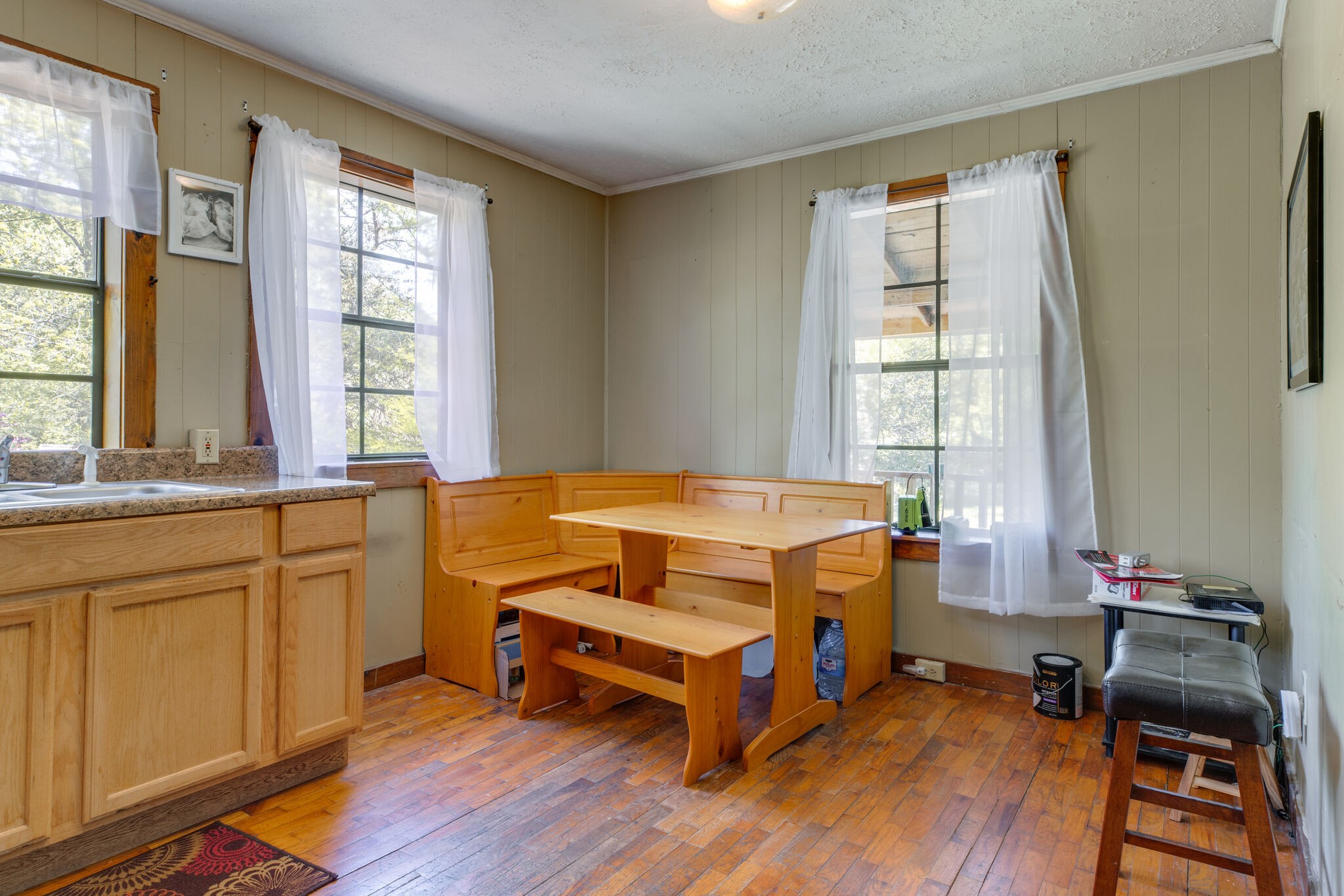 7196 Pinewood Road Nunnelly, TN 37137 - Photo 5 of 49 a bedroom with a bed and wooden floor