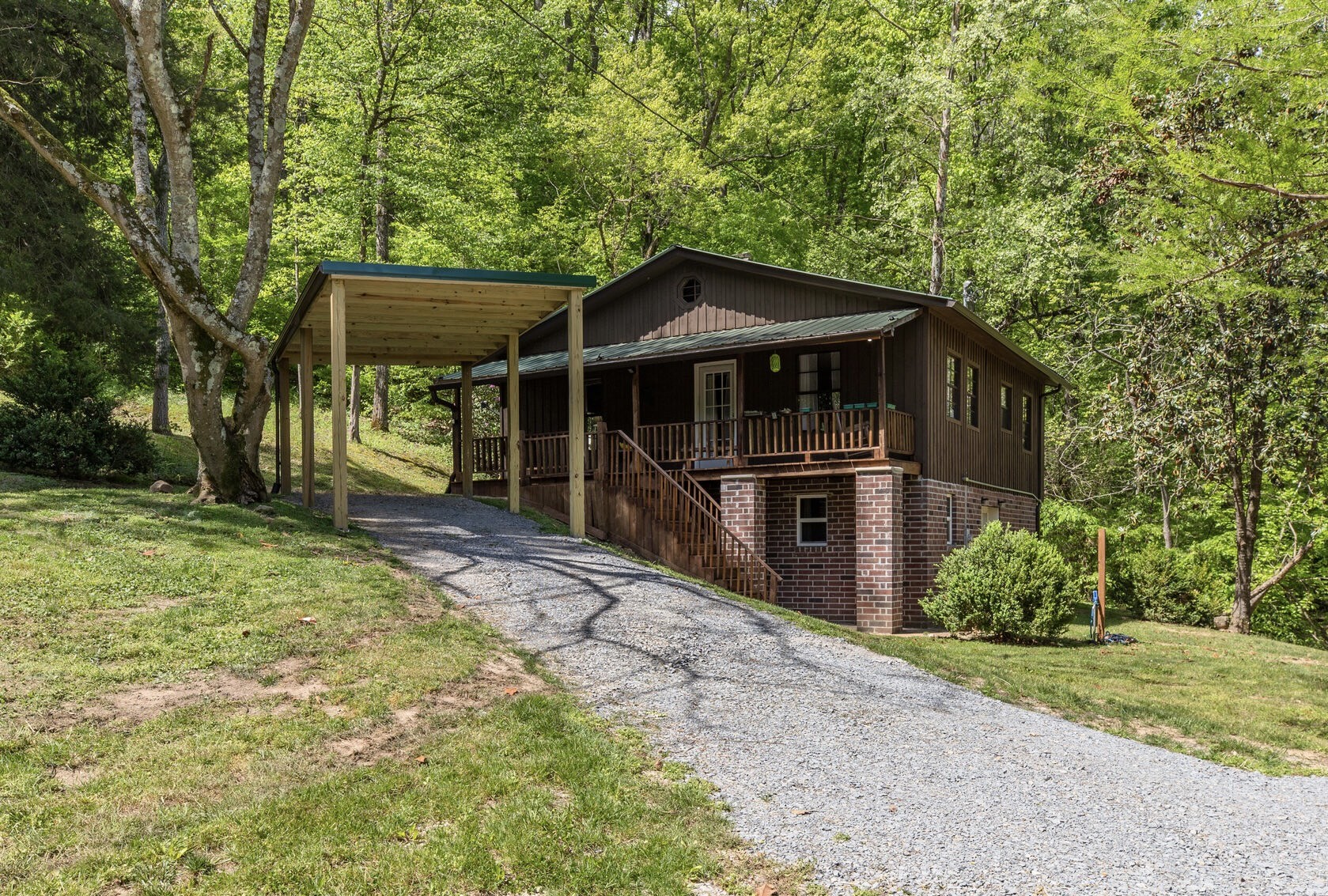 7196 Pinewood Road Nunnelly, TN 37137 - Photo 6 of 49 front view of a house with a yard