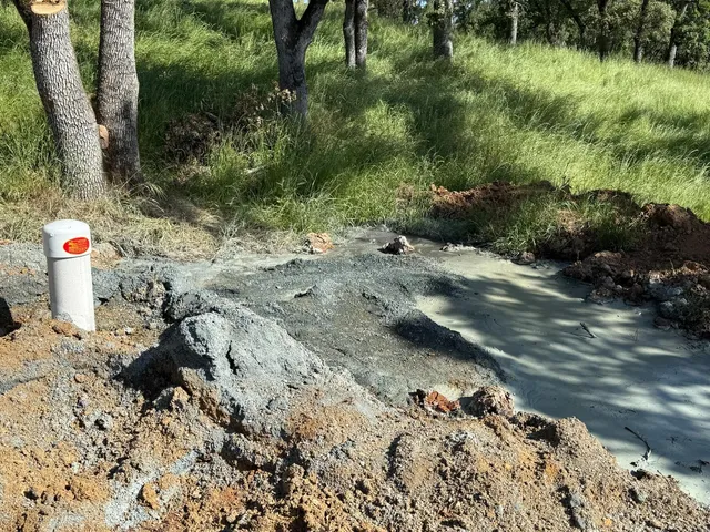 a view of a backyard of a house