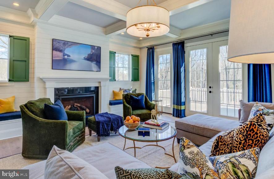 837-lot1 Nathan Hale Road Berwyn, PA 19312 - Photo 9 of 26 a living room with furniture and a fireplace