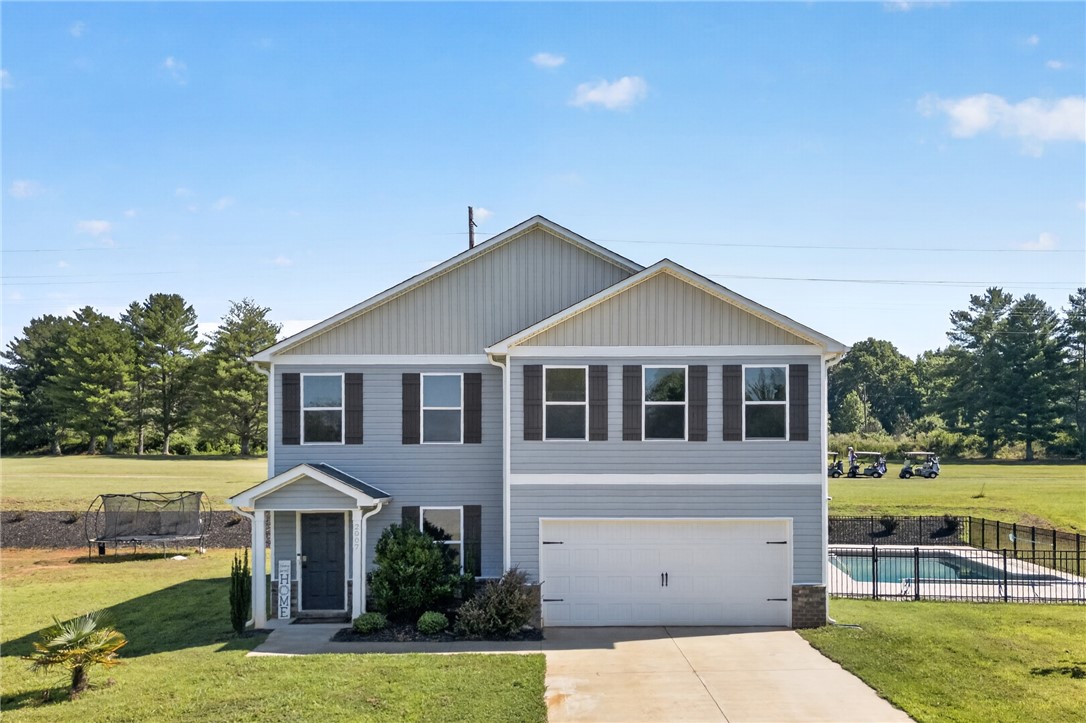 2007 Aberdeen Lane Walhalla, SC 29691 - Photo 1 of 41 A well-maintained two-story home with a pristine lawn and a private pool, offering a desirable residential experience.