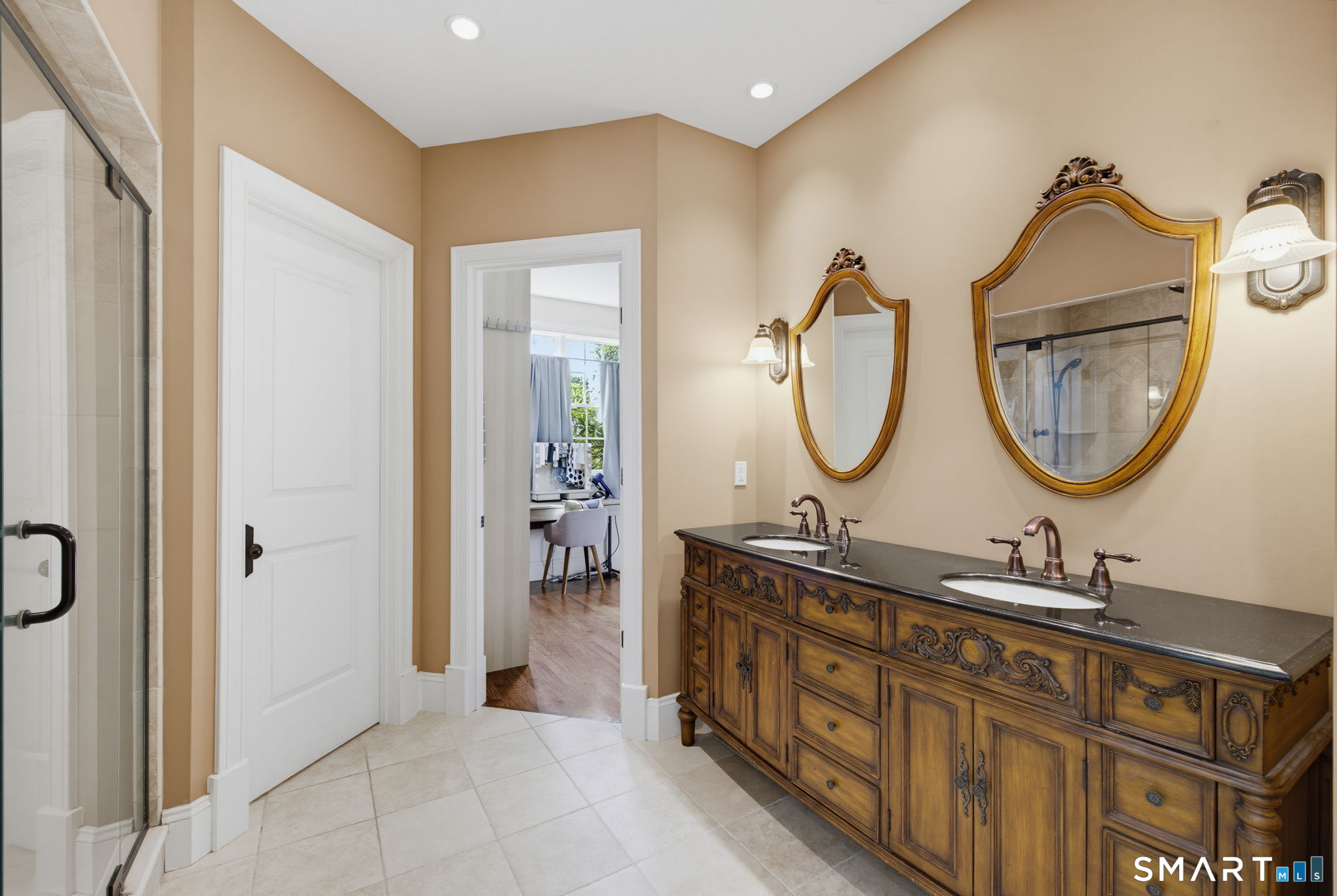 158 Appian Way Coventry, CT 06238 - Photo 23 of 40 a bathroom with a double vanity sink and a mirror
