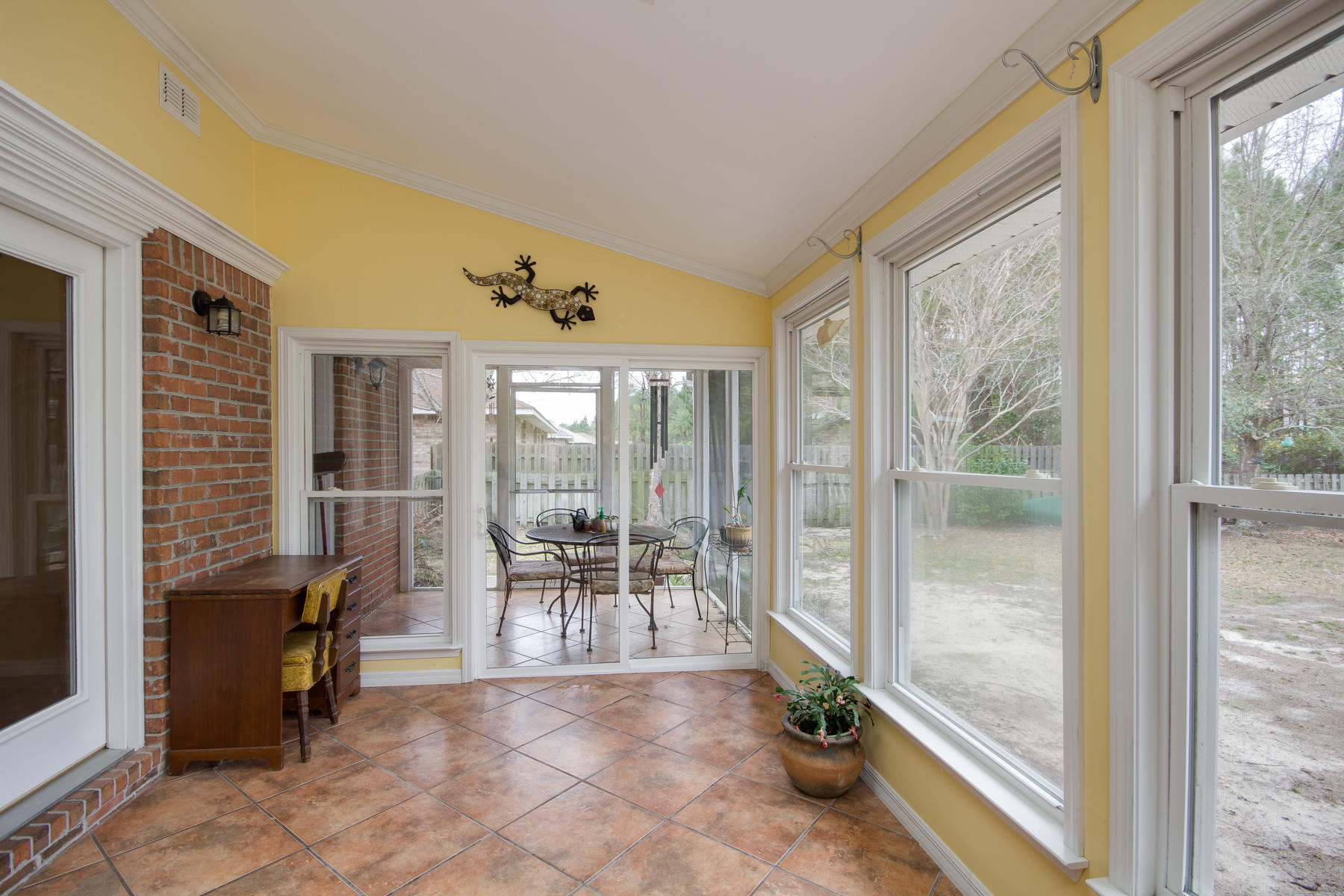 166 East Shipwreck Road Santa Rosa Beach, FL 32459 - Photo 14 of 33 a view of a livingroom with furniture and floor to ceiling window