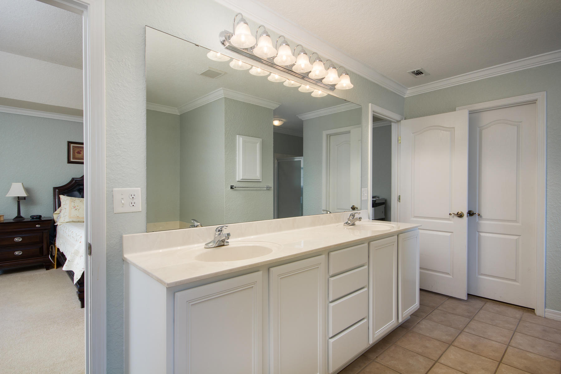 166 East Shipwreck Road Santa Rosa Beach, FL 32459 - Photo 15 of 33 a room with a sink vanity and a mirror