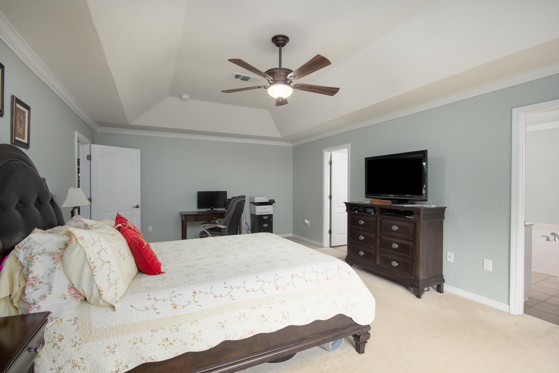 166 East Shipwreck Road Santa Rosa Beach, FL 32459 - Photo 16 of 33 a bedroom with a bed and a flat screen tv