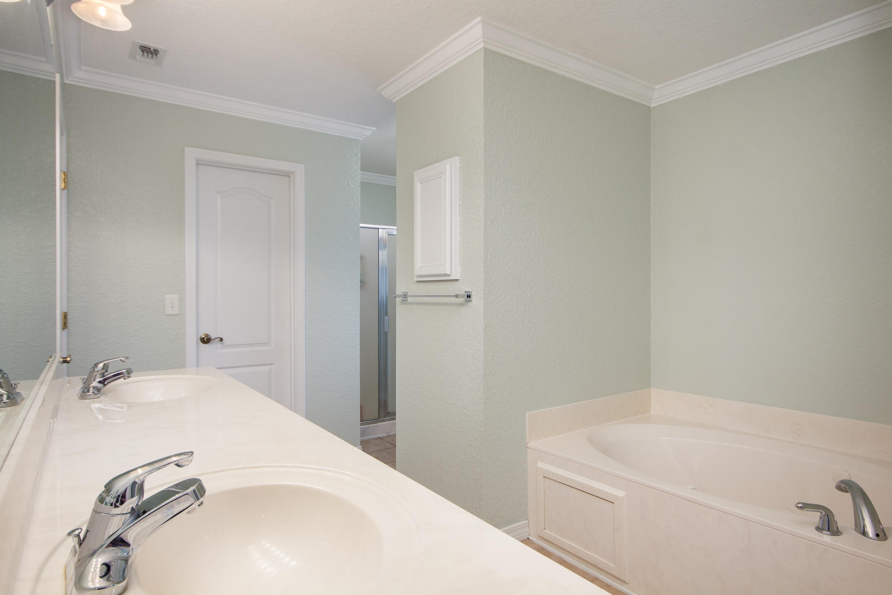 166 East Shipwreck Road Santa Rosa Beach, FL 32459 - Photo 17 of 33 a bathroom with a tub sink and vanity