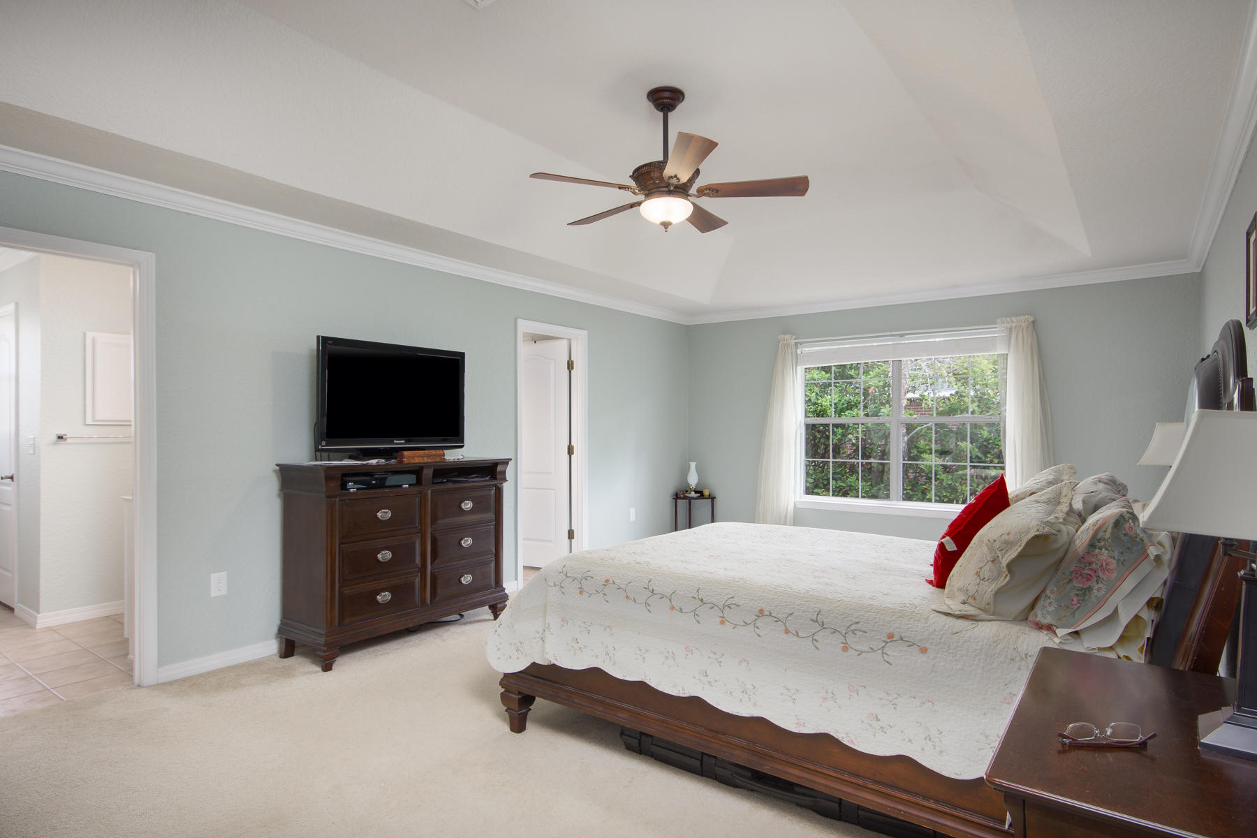 166 East Shipwreck Road Santa Rosa Beach, FL 32459 - Photo 18 of 33 a bedroom with a bed and a flat screen tv