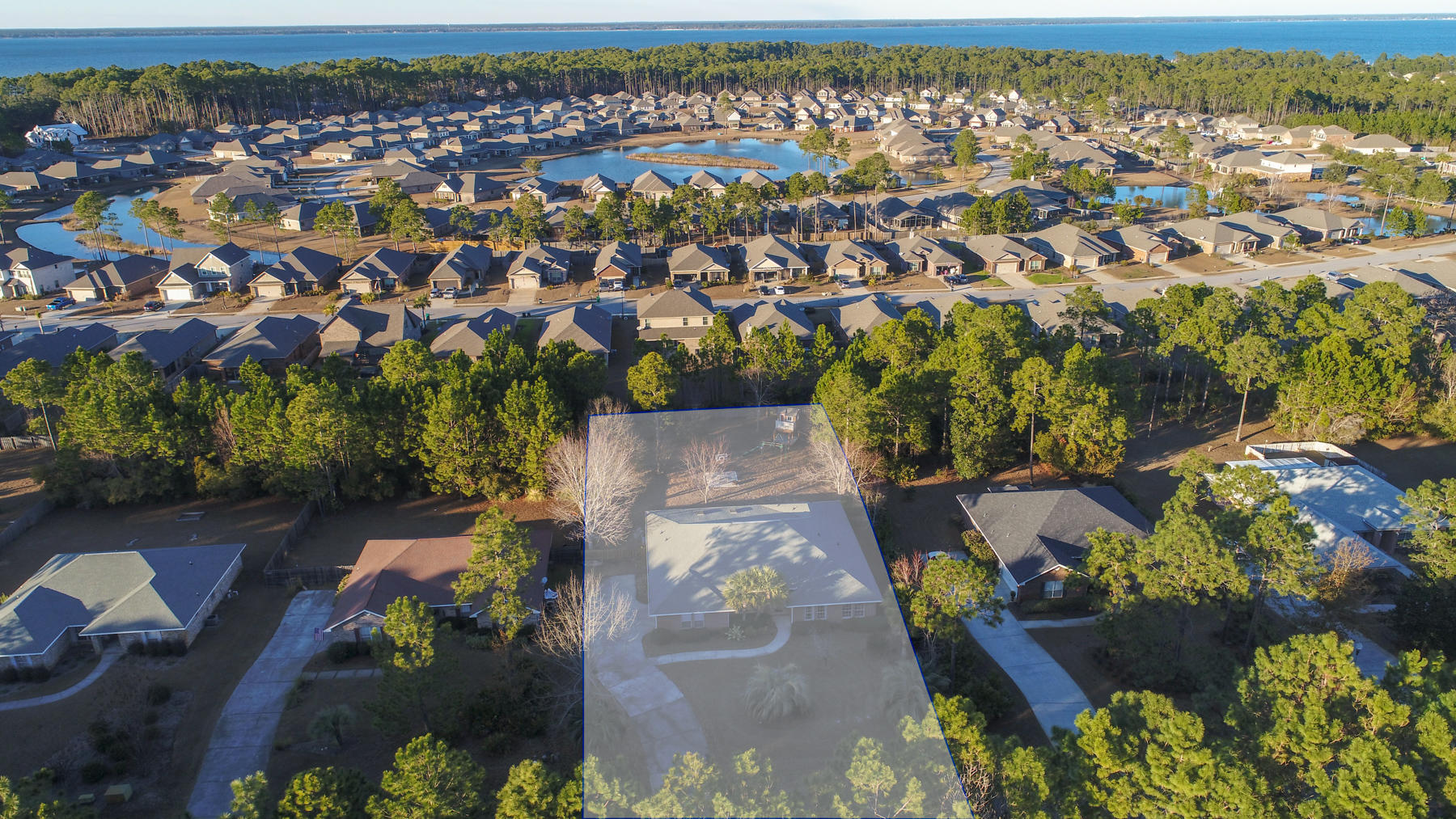 166 East Shipwreck Road Santa Rosa Beach, FL 32459 - Photo 27 of 33 an aerial view of residential houses with outdoor space