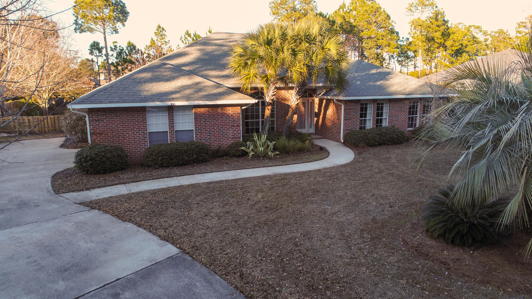 166 East Shipwreck Road Santa Rosa Beach, FL 32459 - Photo 31 of 33 a front view of a house with a yard