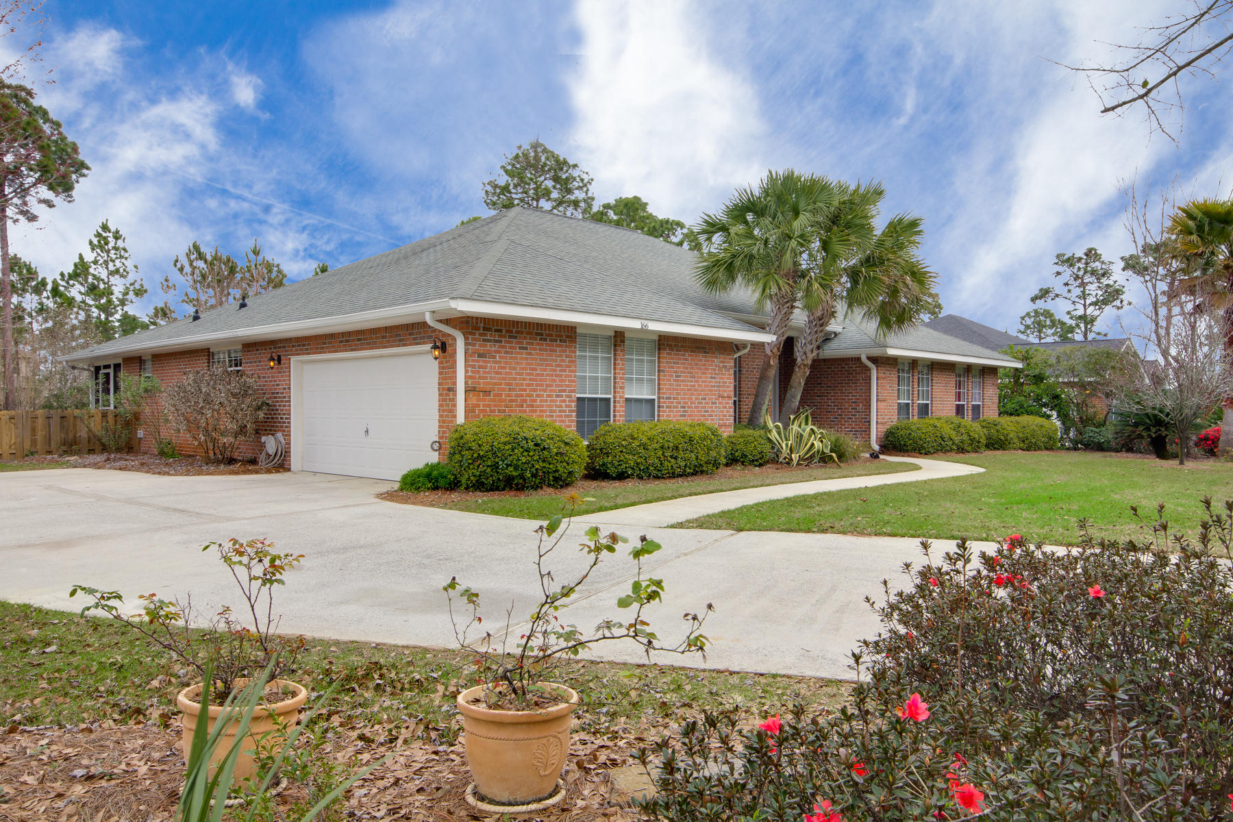 166 East Shipwreck Road Santa Rosa Beach, FL 32459 - Photo 33 of 33 a front view of a house with garden