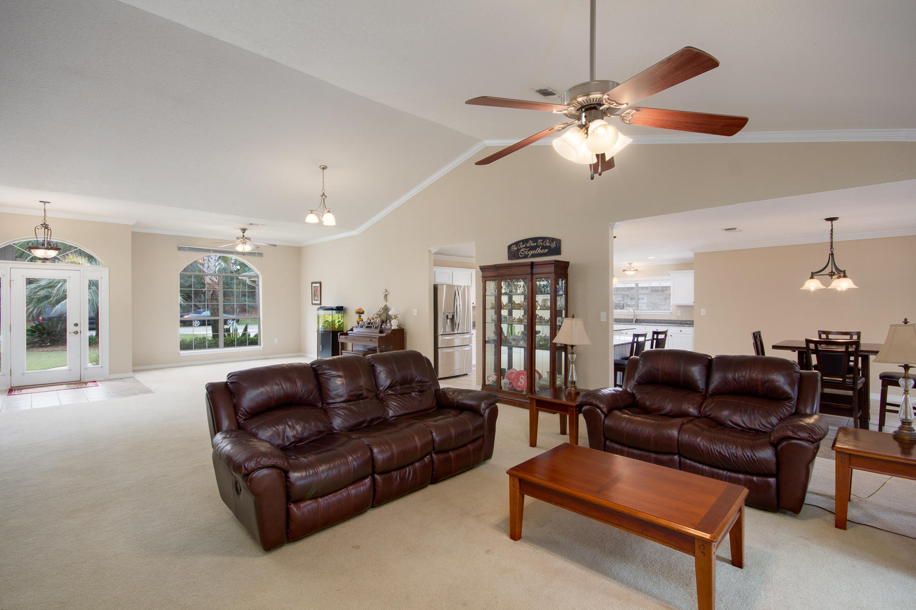 166 East Shipwreck Road Santa Rosa Beach, FL 32459 - Photo 4 of 33 a living room with furniture and a ceiling fan