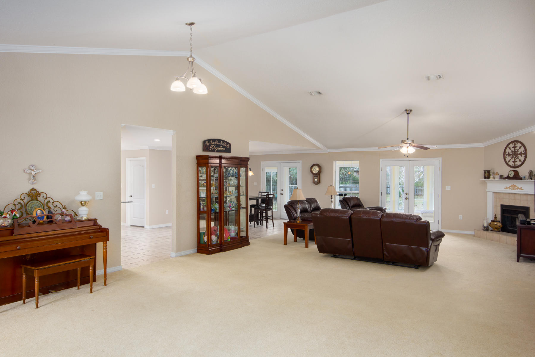 166 East Shipwreck Road Santa Rosa Beach, FL 32459 - Photo 5 of 33 a living room with furniture and a chandelier