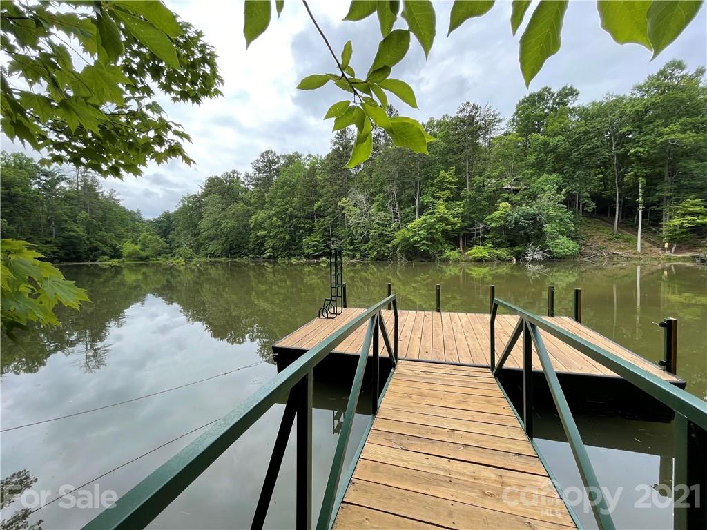 999 South Cove Road, Unit 29 & 30 Mill Spring, NC 28756 - Photo 1 of 12 a lake view with a lake view