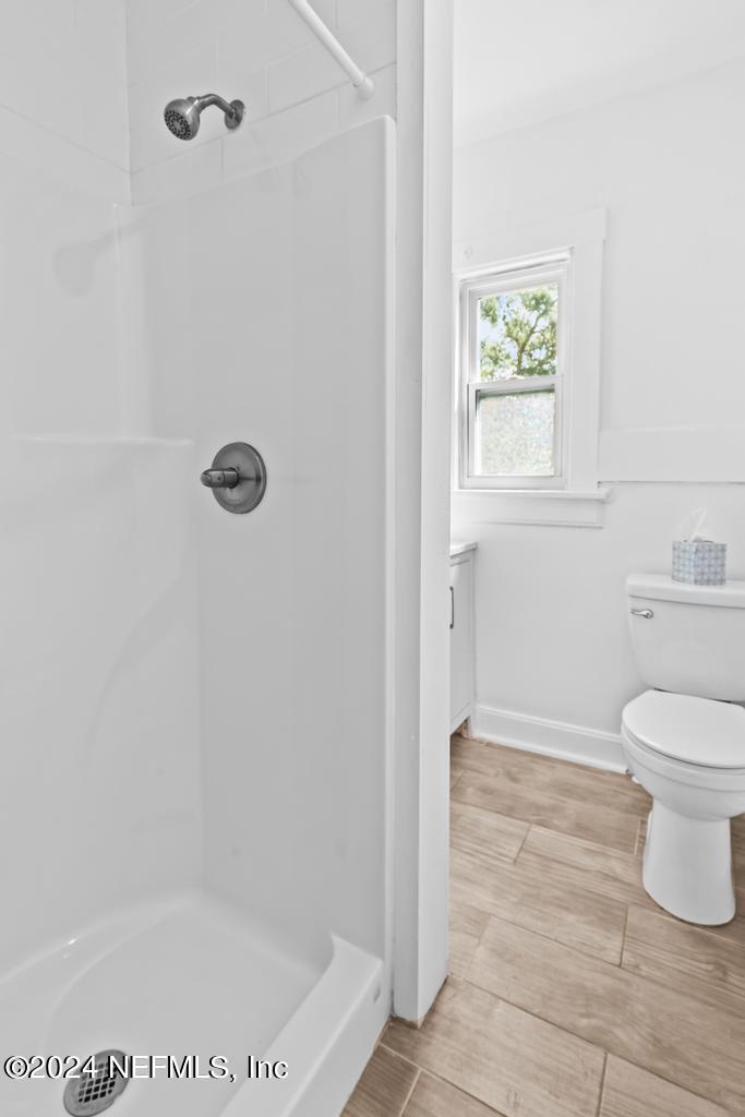 313 A St George Street St. Augustine, FL 32084 - Photo 18 of 21 a bathroom with a toilet and a shower