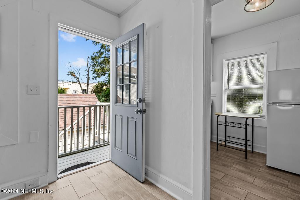 313 A St George Street St. Augustine, FL 32084 - Photo 2 of 21 a view of a livingroom from a hallway