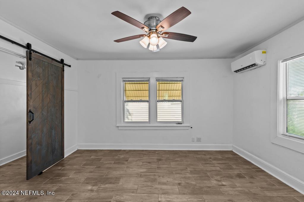 313 A St George Street St. Augustine, FL 32084 - Photo 4 of 21 a view of an empty room with a window