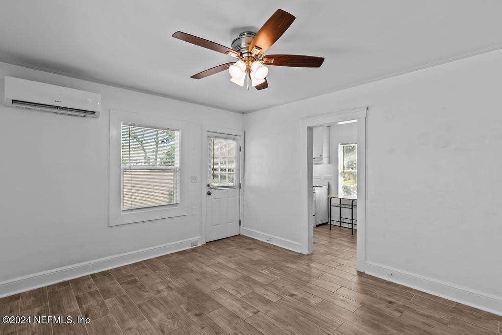 313 A St George Street St. Augustine, FL 32084 - Photo 6 of 21 a view of an empty room with a window