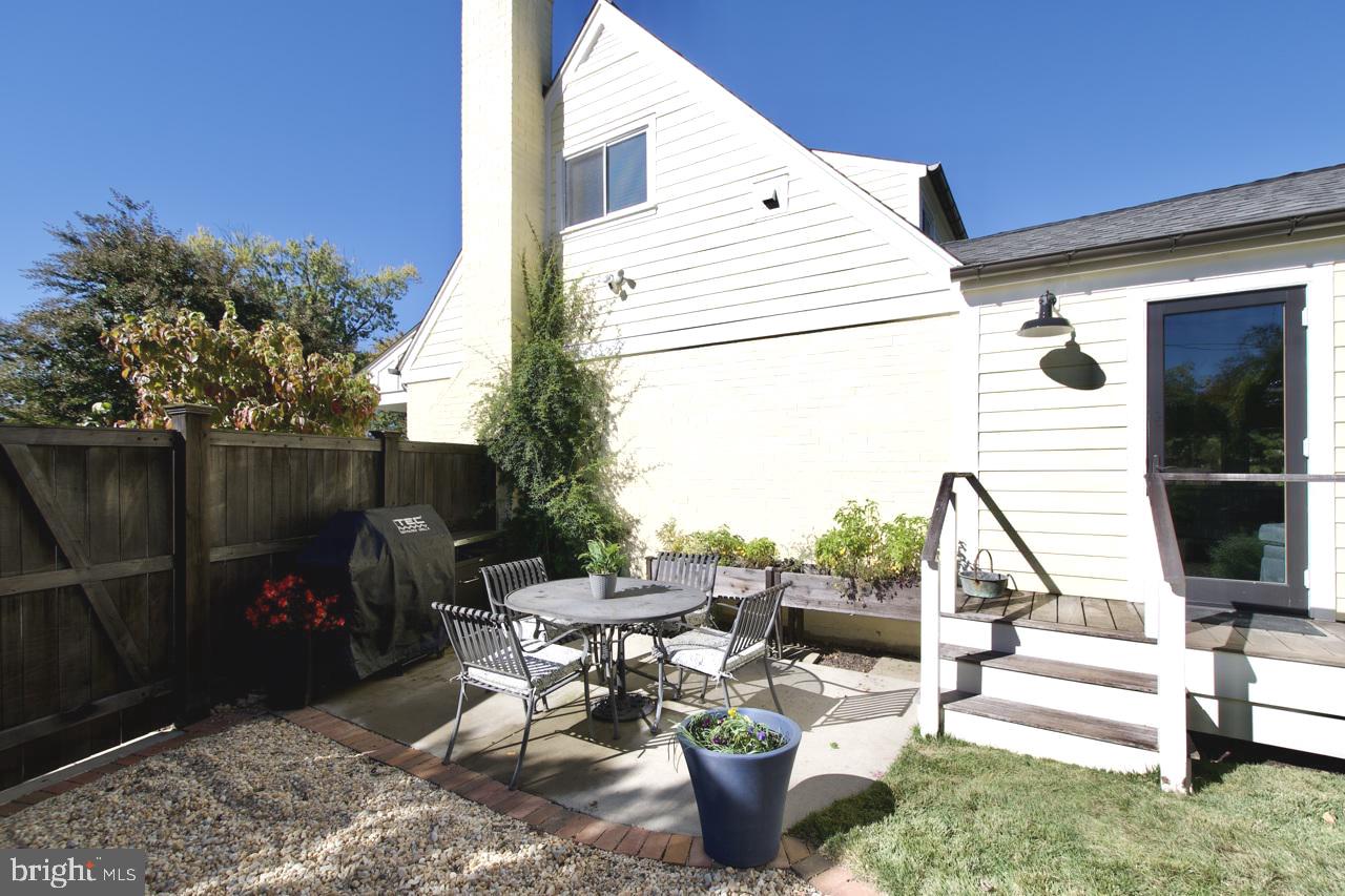 5005 Rhoades Place Alexandria, VA 22304 - Photo 44 of 55 CONCRETE PATIO OFF SIDE OF KITCHEN AND SUNROOM $$
