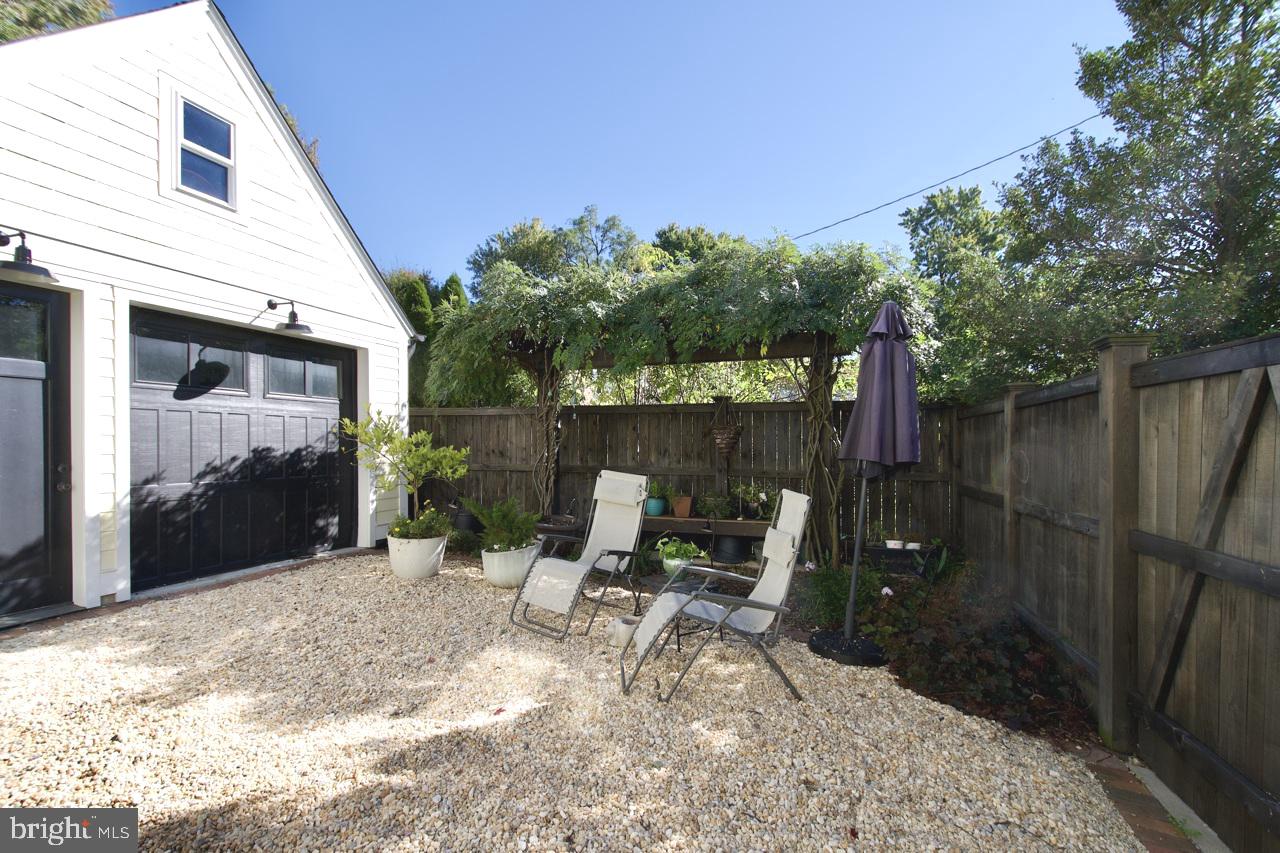 5005 Rhoades Place Alexandria, VA 22304 - Photo 45 of 55 PATIO and TRELLIS AREA IN FRONT OF GARAGE $$