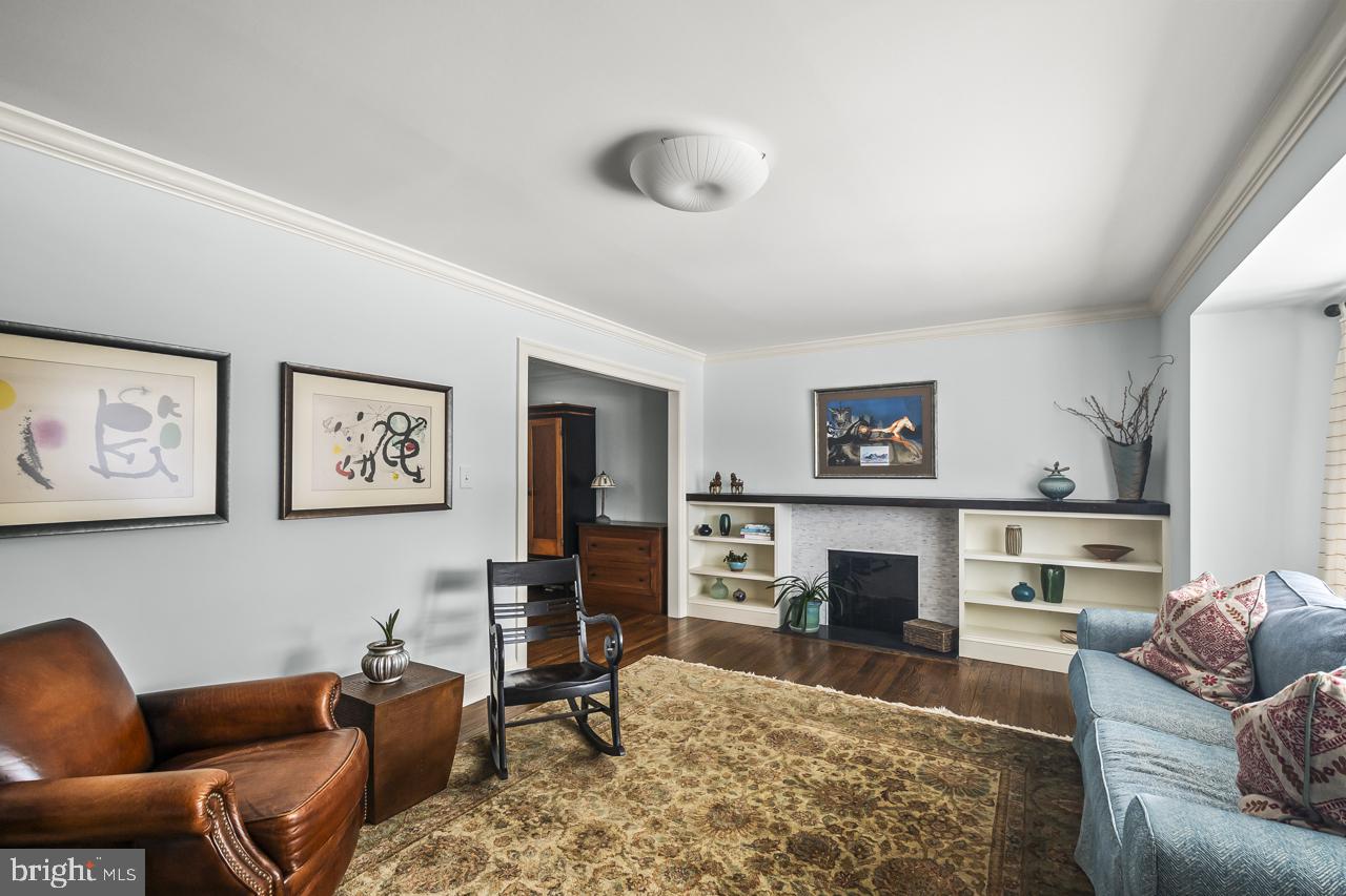5005 Rhoades Place Alexandria, VA 22304 - Photo 6 of 55 LIVING ROOM W/GAS FIREPLACE & BUILT-IN SHELVING
