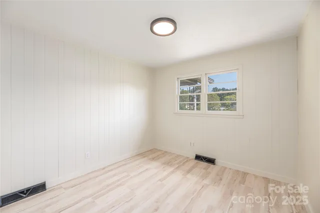 an empty room with a workbench