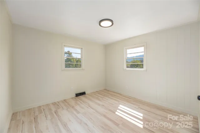 an empty room with windows