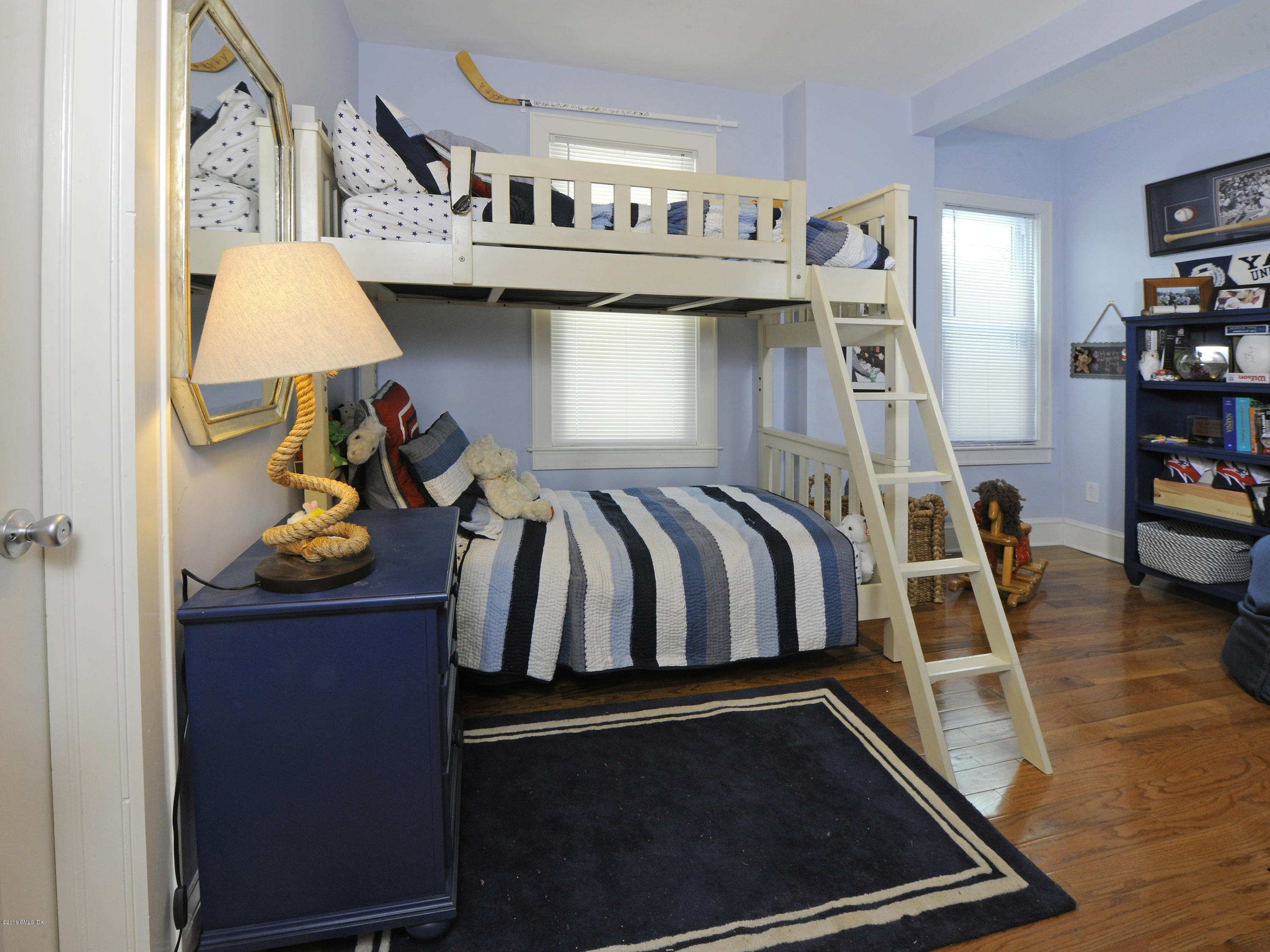 44 Riversville Road Greenwich, CT 06831 - Photo 6 of 19 a view of walk in closet with clothes and shoes