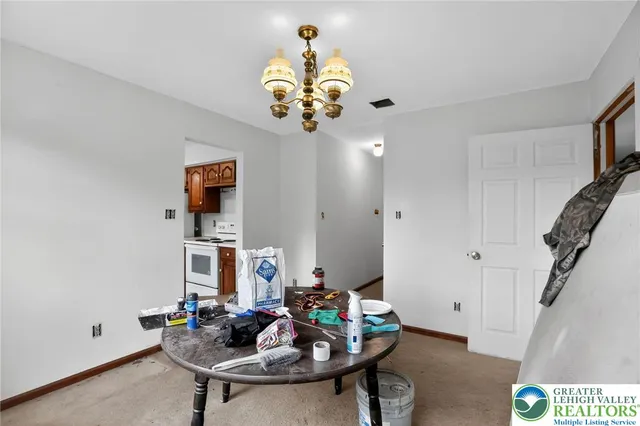 a view of a workspace with furniture