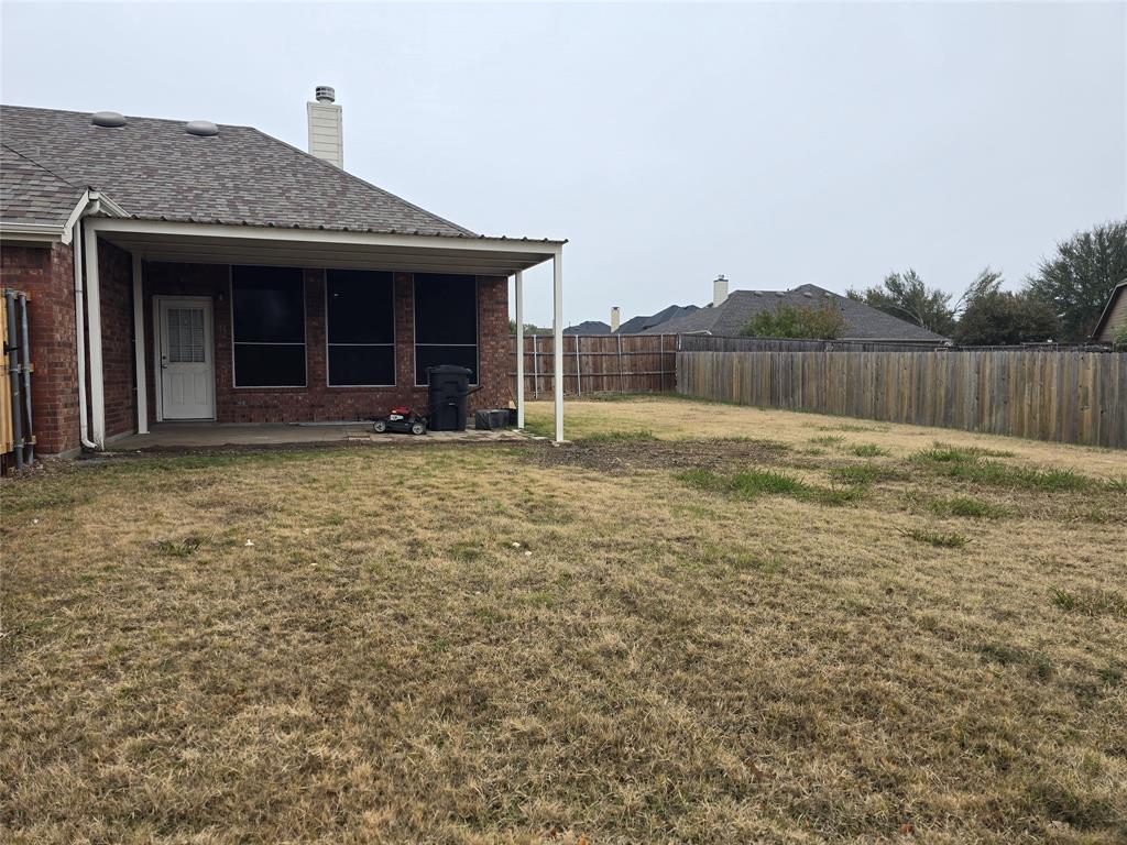 100 Bryan Street Prosper, TX 75078 - Photo 18 of 18 a view of a house with a yard and large tree