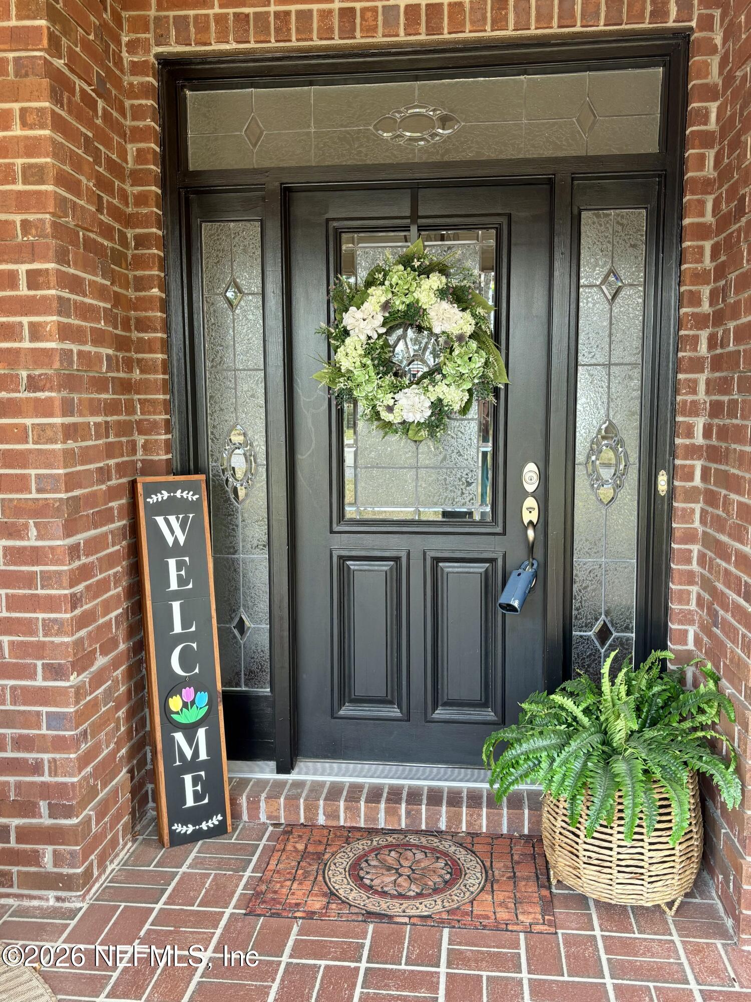 a view of a entryway door front of house