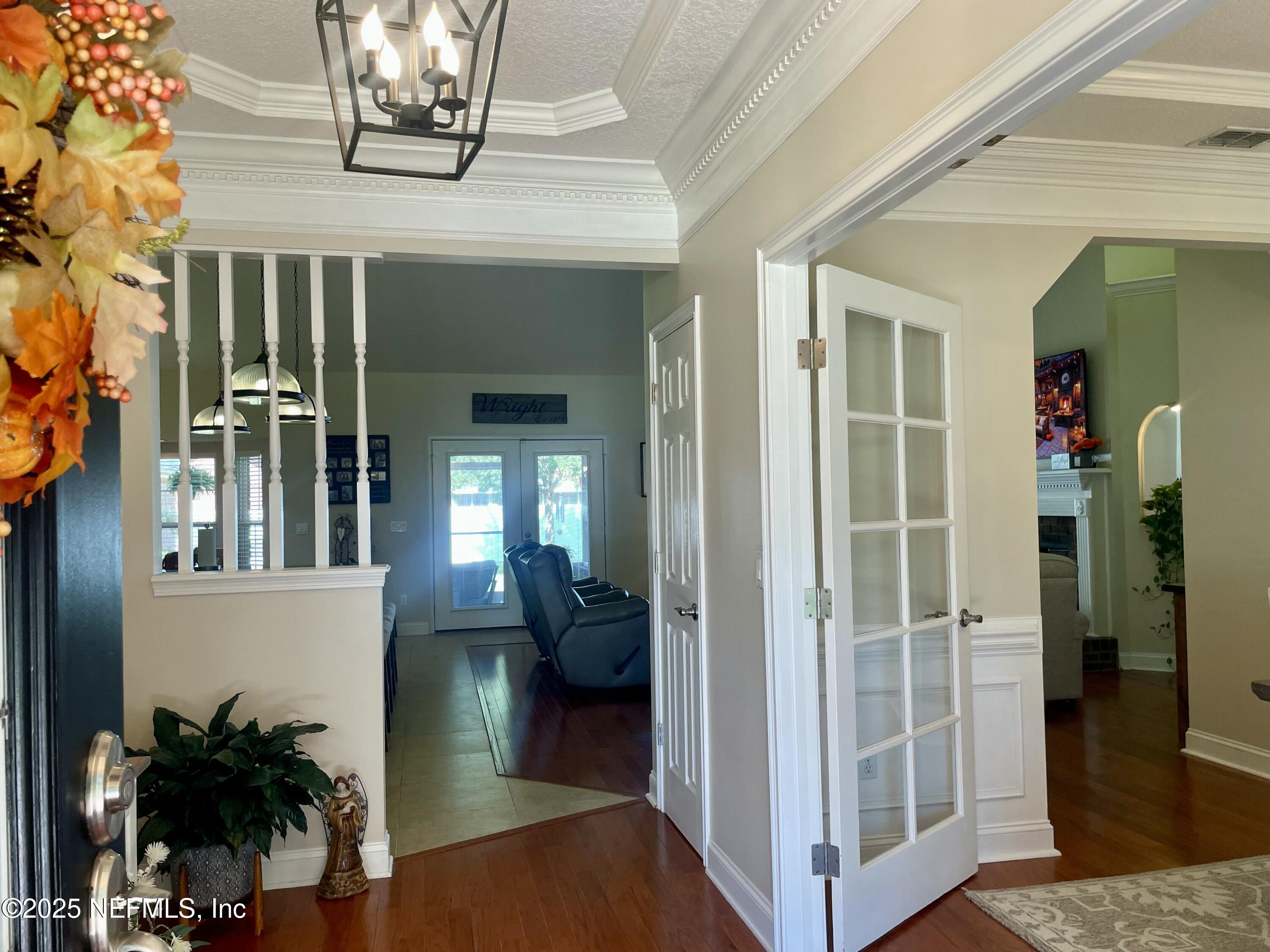 1168 Copper Gate Place Macclenny, FL 32063 - Photo 11 of 44 a view of a hallway with entryway and livingroom