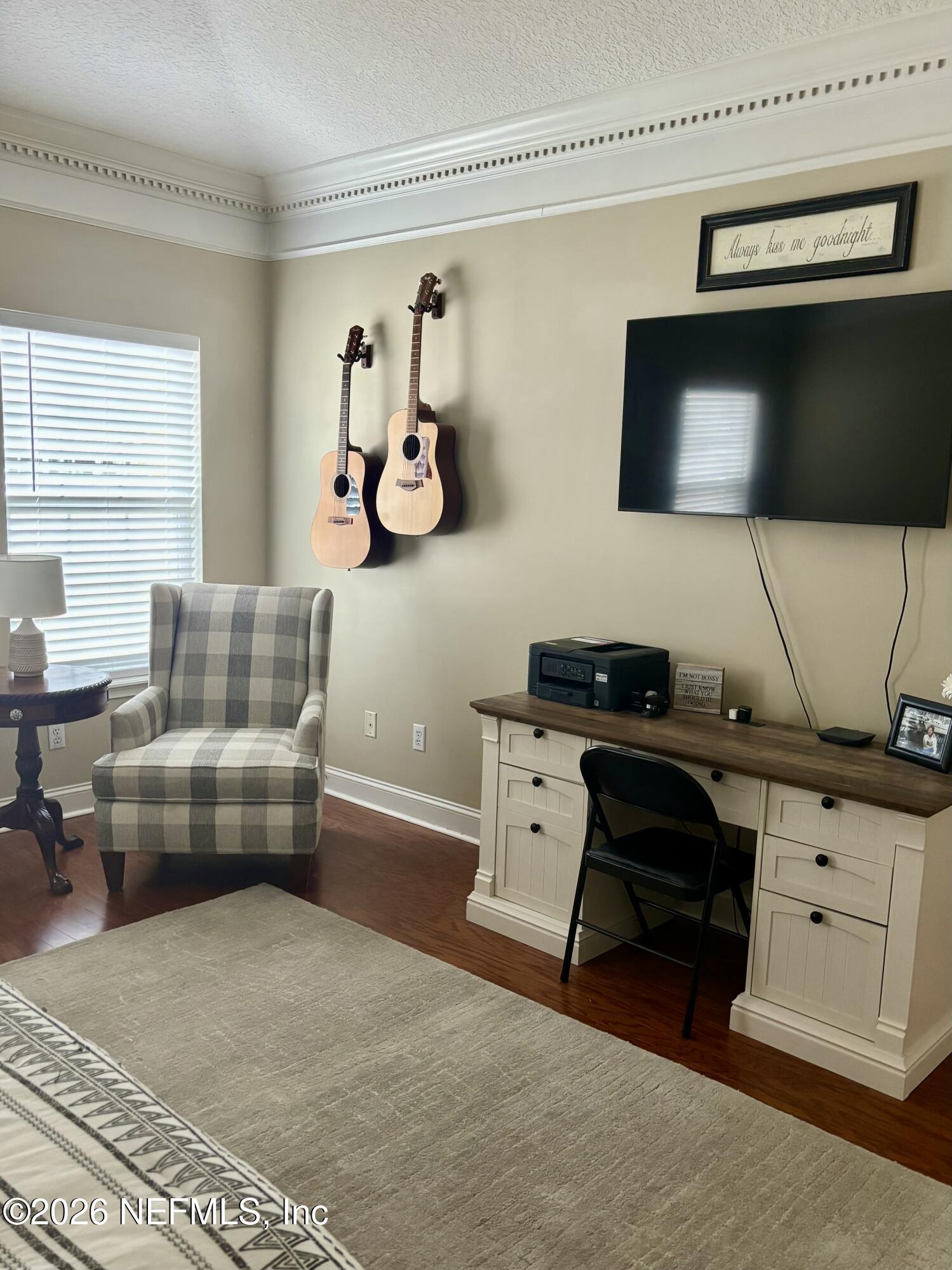1168 Copper Gate Place Macclenny, FL 32063 - Photo 22 of 51 a living room with furniture and a flat screen tv