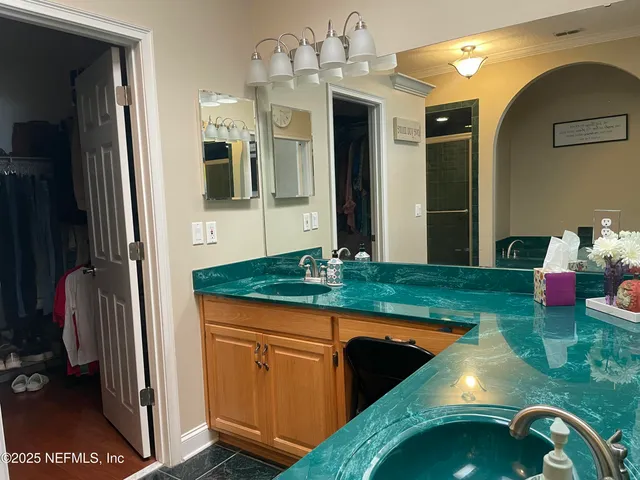 a kitchen with kitchen island granite countertop lots of counter top space