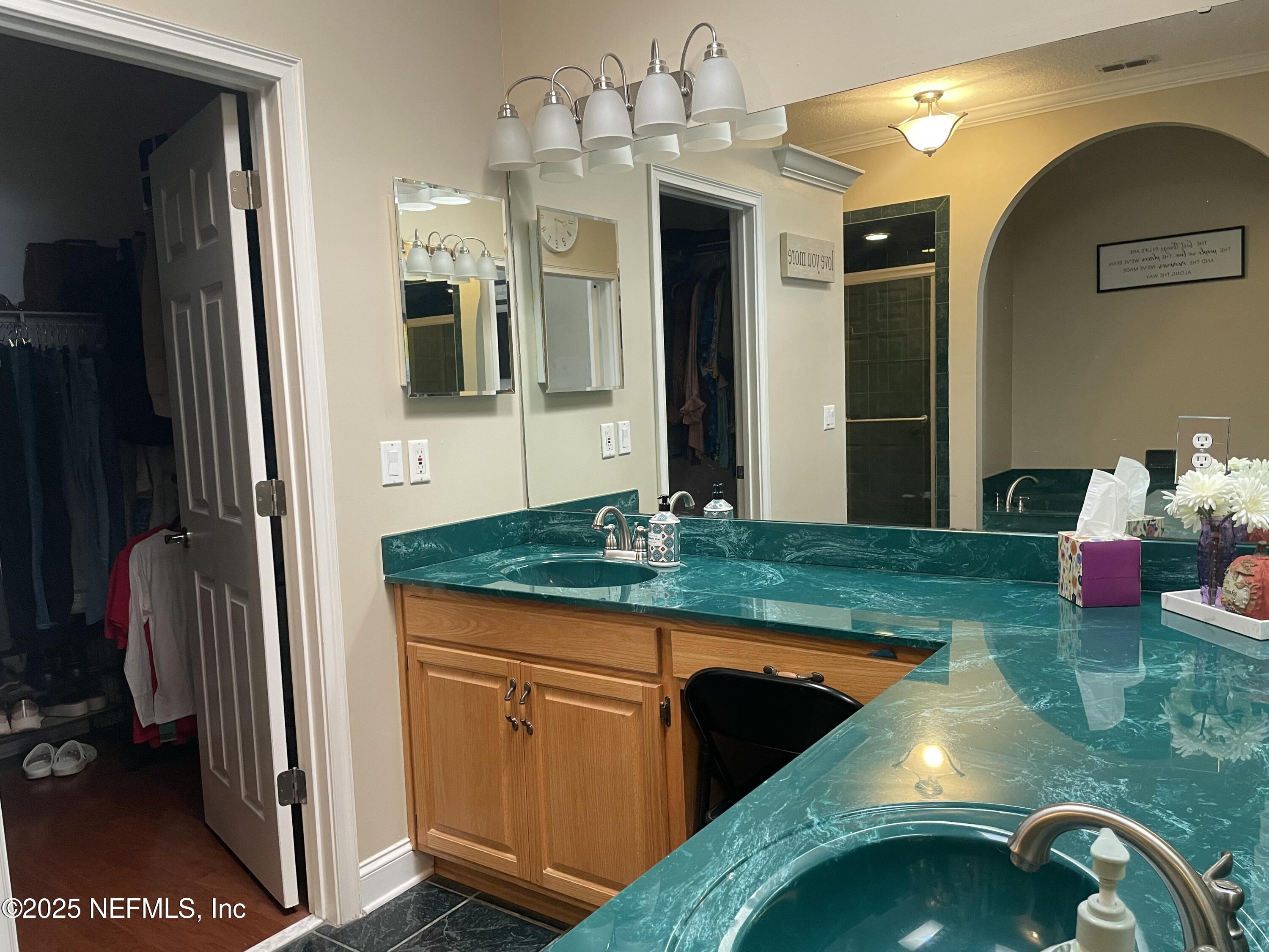 1168 Copper Gate Place Macclenny, FL 32063 - Photo 29 of 44 a kitchen with kitchen island granite countertop lots of counter top space