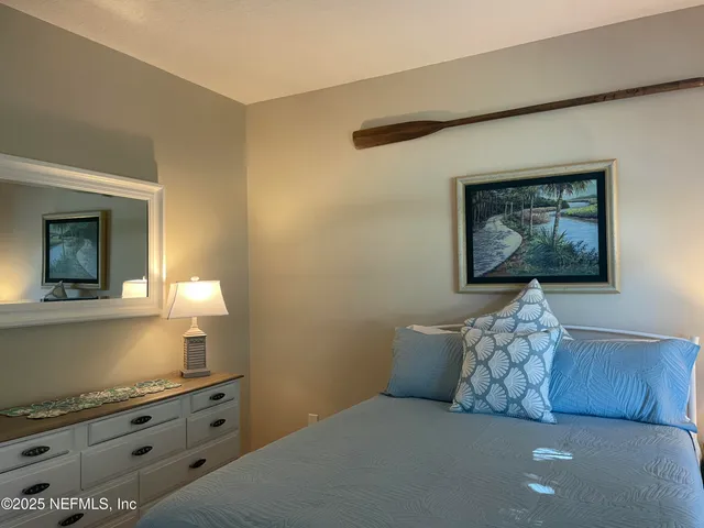 a bathroom with a sink toilet a mirror and shower