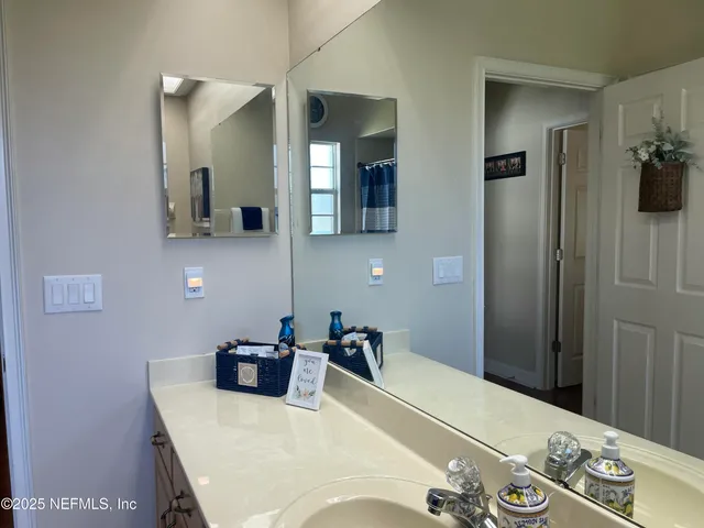 a view of a door and wooden floor