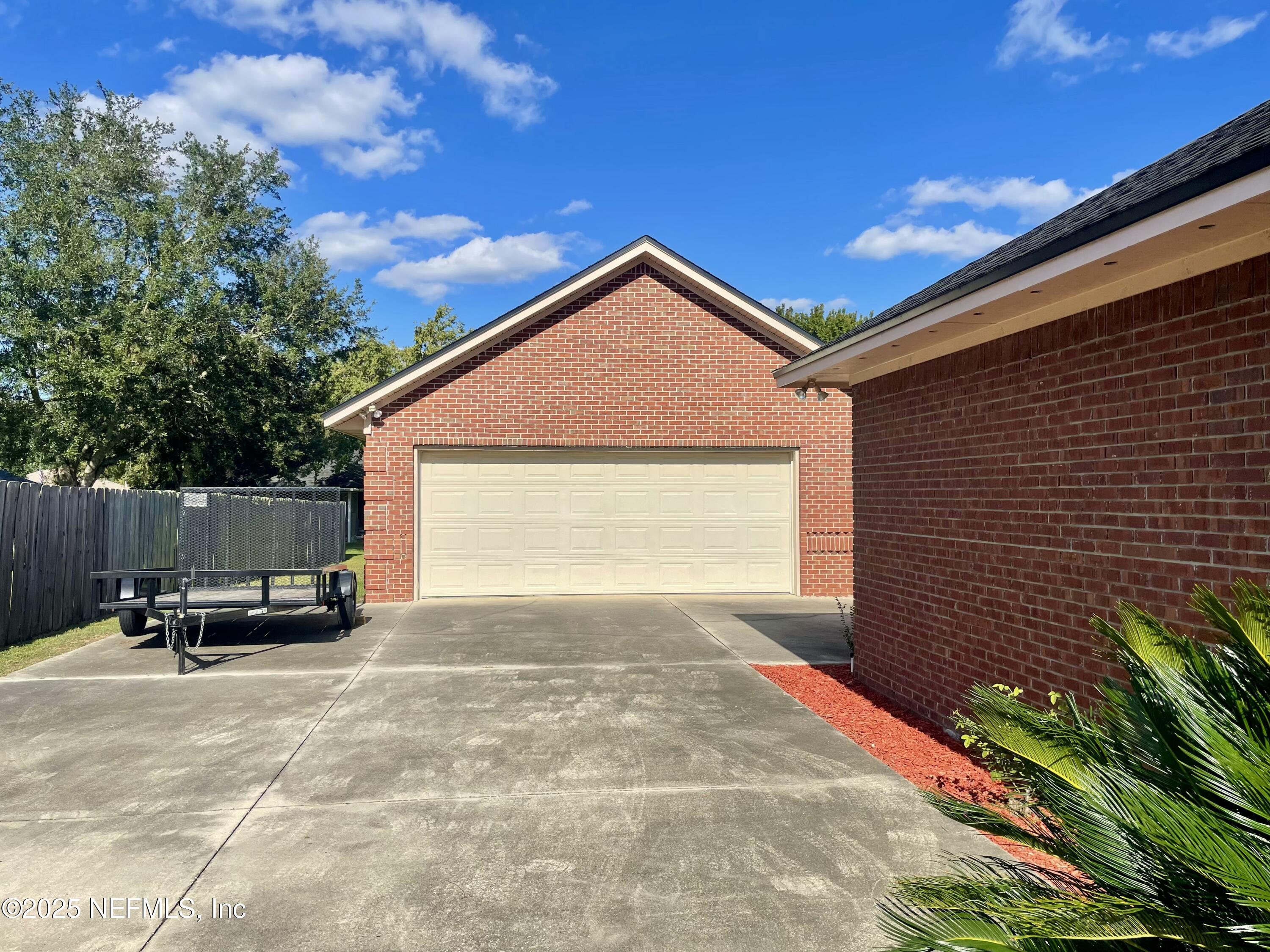 1168 Copper Gate Place Macclenny, FL 32063 - Photo 9 of 51 a view of outdoor space and yard
