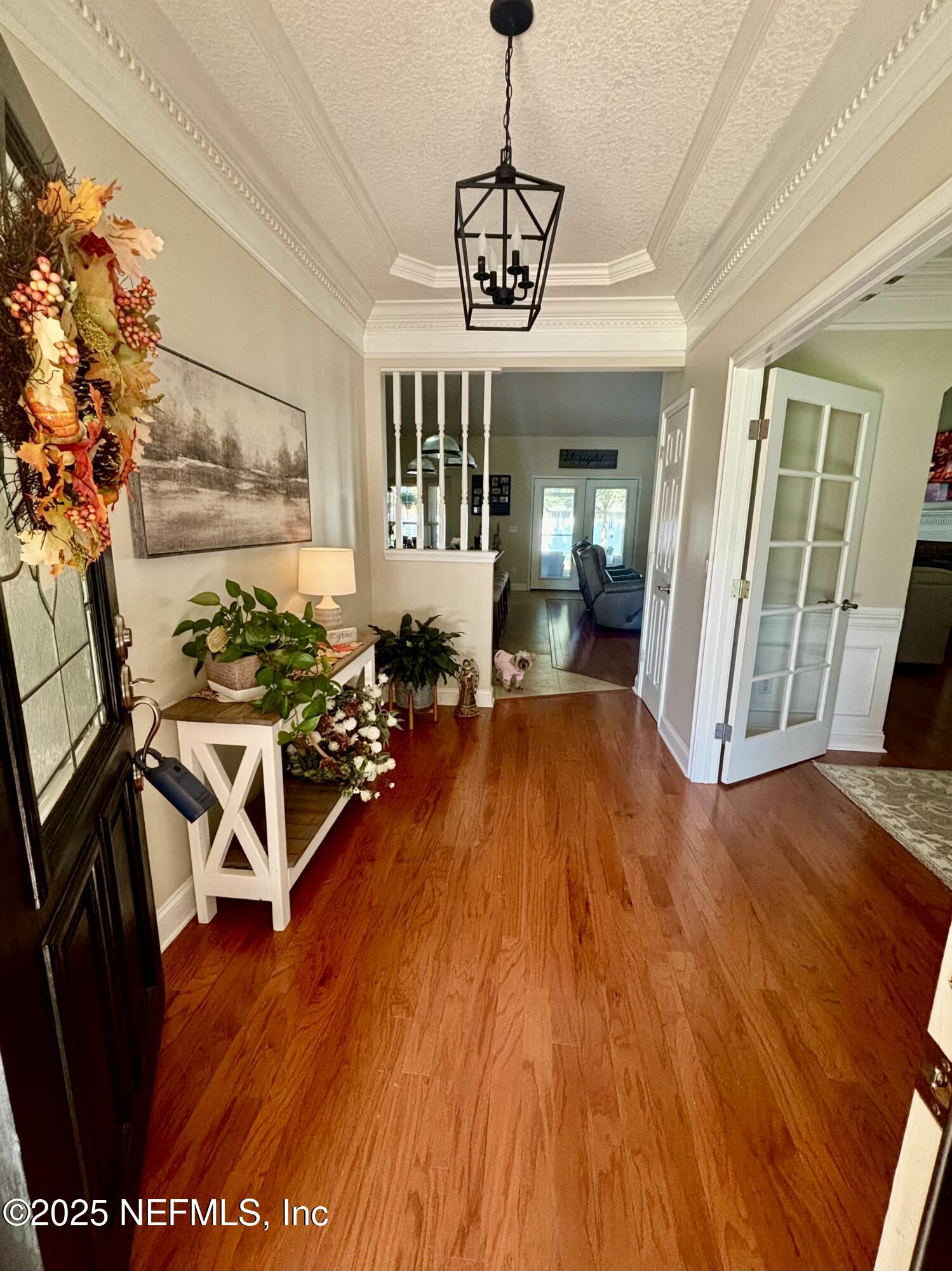 1168 Copper Gate Place Macclenny, FL 32063 - Photo 10 of 44 a view of a room with wooden floor