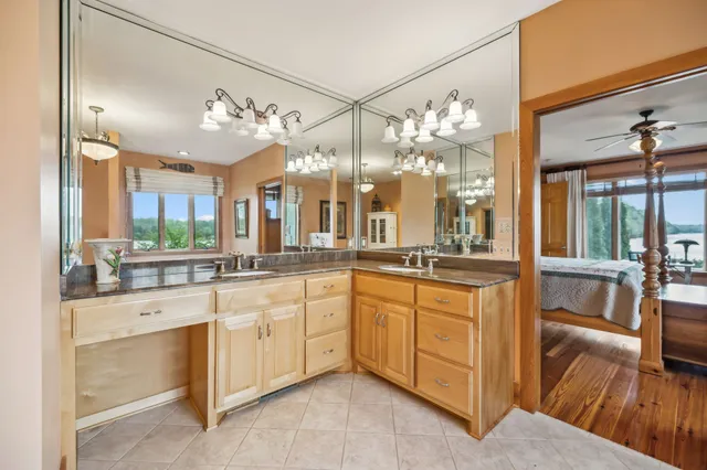 a bathroom with a shower and a sink