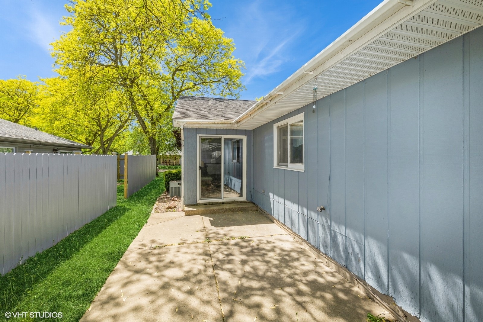 1214 Thomas Drive Woodstock, IL 60098 - Photo 2 of 14 a view of a house with a yard