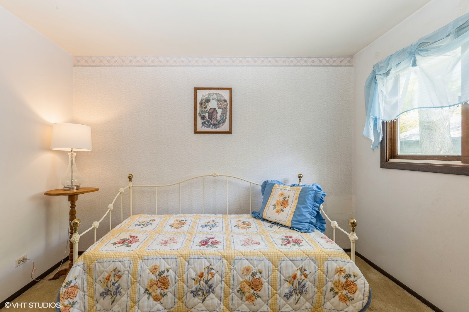 1214 Thomas Drive Woodstock, IL 60098 - Photo 10 of 14 a bedroom with a bed and a window