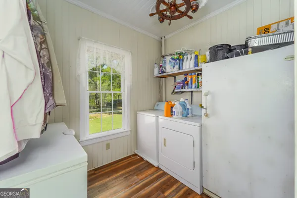 a bedroom with a bed and a mirror
