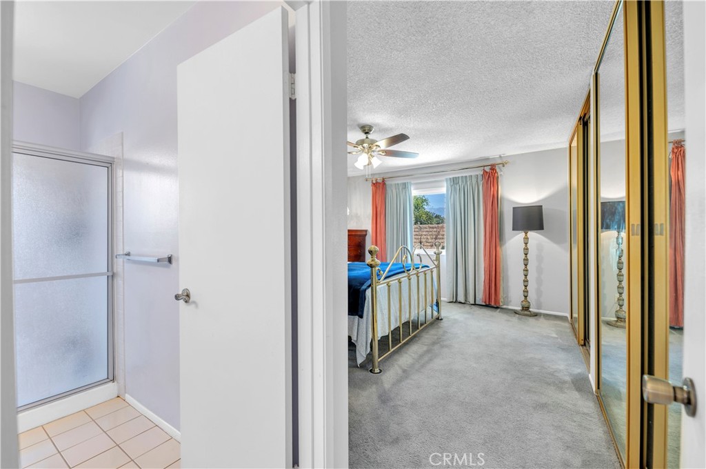 1114 Bottle Tree Way Hemet, CA 92545 - Photo 14 of 25 a view of a hallway with wooden shelves