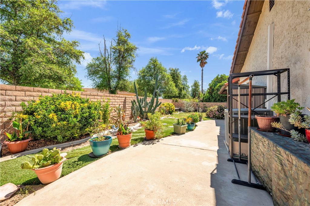 1114 Bottle Tree Way Hemet, CA 92545 - Photo 24 of 25 a view of a terrace with outdoor seating and plants